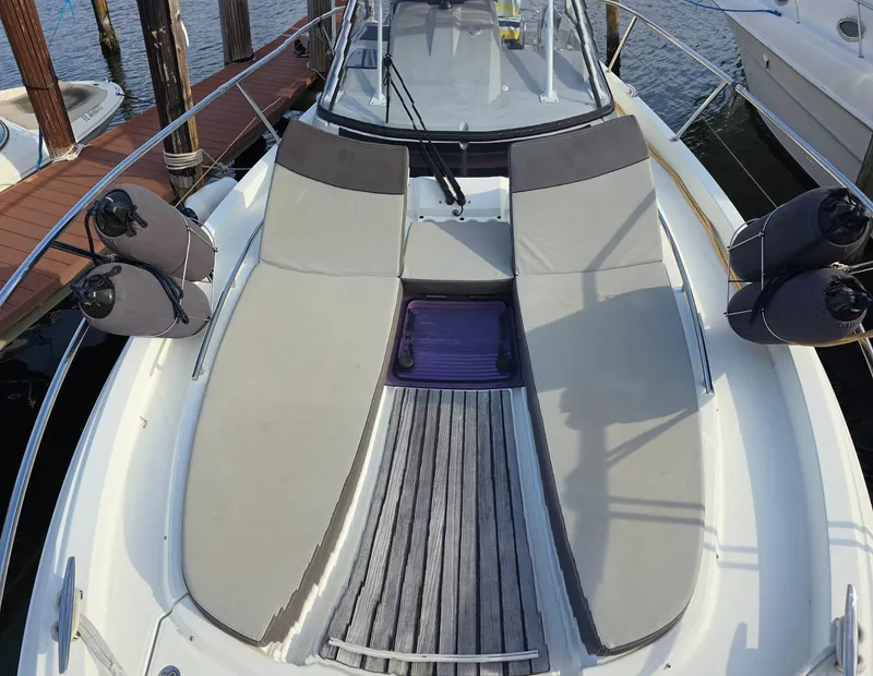 Slide: The Image of 2019 Jeanneau Leader 10.5 boat with spacious sunbathing area and sleek design. - 22