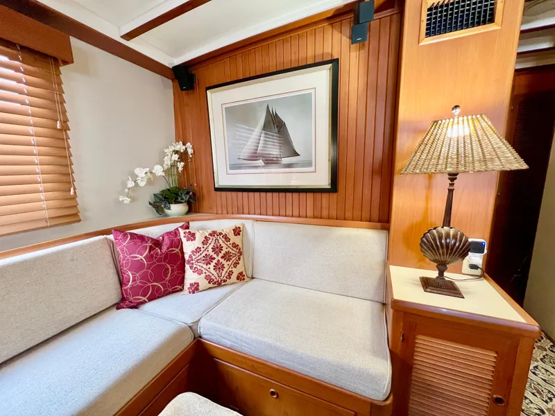 Slide: The Image of Cozy interior of 2001 Kadey-Krogen 48 Whaleback with elegant decor and comfortable seating. - 11