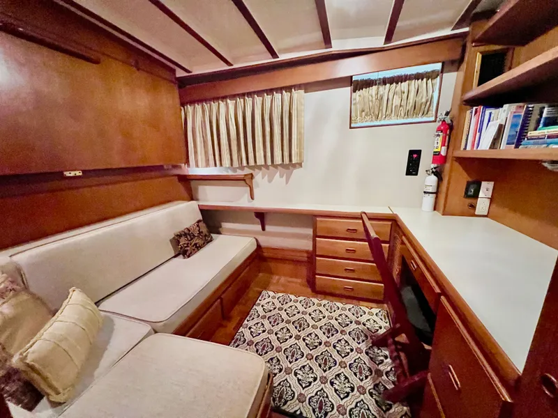 Slide: The Image of Cozy interior of 2001 Kadey-Krogen 48 Whaleback with wood furnishings and seating area. - 18