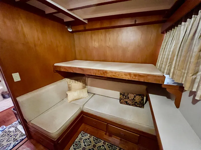 Slide: The Image of Cozy cabin interior of 2001 Kadey-Krogen 48 Whaleback with bunk and seating area. - 21