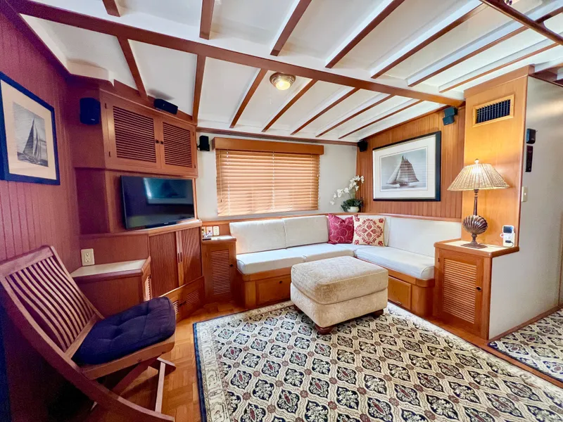 Slide: The Image of Luxurious 2001 Kadey-Krogen 48 Whaleback yacht interior with cozy seating and elegant decor. - 9
