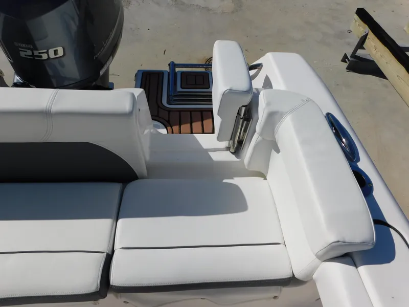 Slide: The Image of 2017 Tidewater 220 LXF boat with white seating and Yamaha 250 engine. - 15