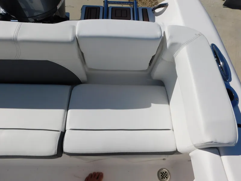 Slide: The Image of White cushioned seating on a 2017 Tidewater 220 LXF boat. - 16