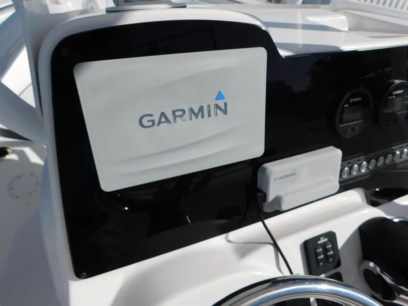 Slide: The Image of Garmin navigation system on 2017 Tidewater 220 LXF boat dashboard. - 19