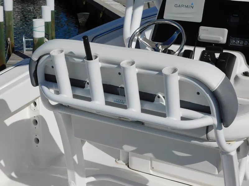 Slide: The Image of Tidewater 220 LXF 2017 boat console with rod holders and Garmin navigation system. - 25