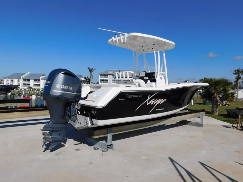 Slide: The Image of 2017 Tidewater 220 LXF boat with Yamaha engine on display outdoors. - 3