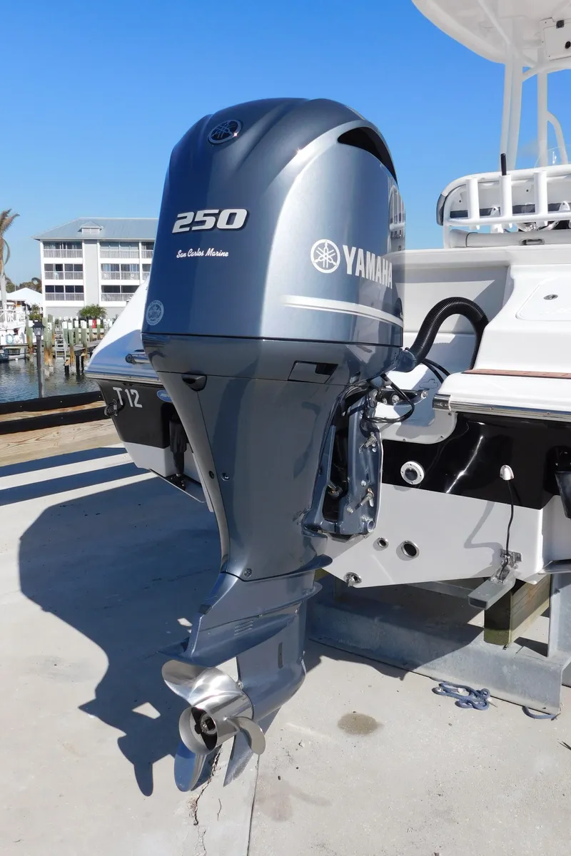 Slide: The Image of 2017 Tidewater 220 LXF with Yamaha 250 outboard motor docked. - 7