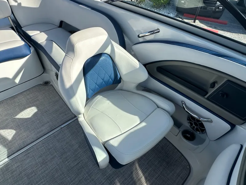 Slide: The Image of 2022 Crownline 260 XSS boat interior with luxurious seating and modern design. - 15