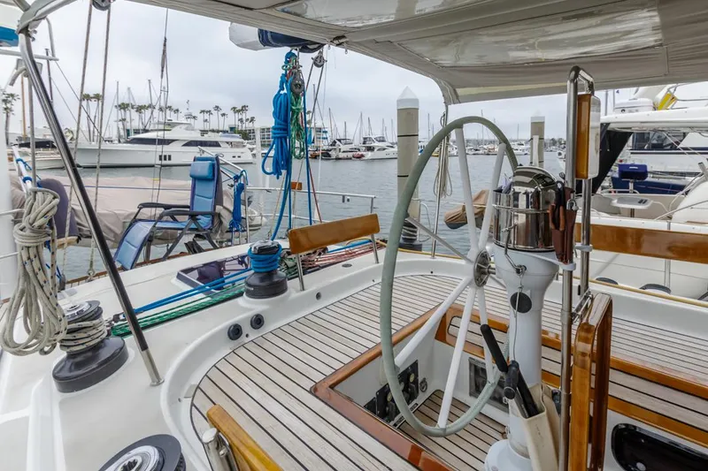 Slide: The Image of Sailboat cockpit view, Farr 55, 1994 model, docked in marina with yachts. - 17