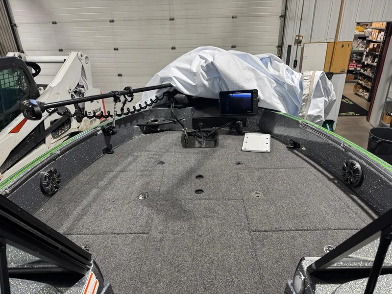 Slide: The Image of 2024 Nitro ZV21 Pro boat interior with advanced navigation system and spacious deck. - 10