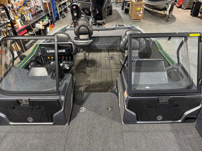 Slide: The Image of 2024 Nitro ZV21 Pro boat interior with dual consoles and seating. - 9