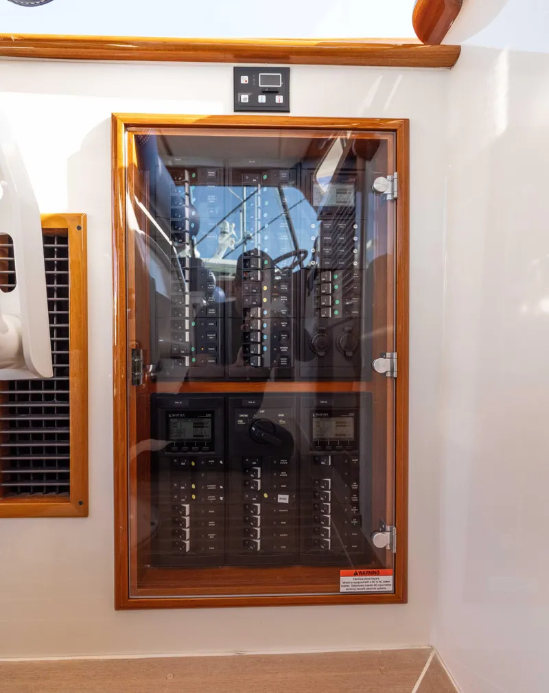 Slide: The Image of Electrical panel inside 2016 Hinckley 37 Picnic Boat. - 22