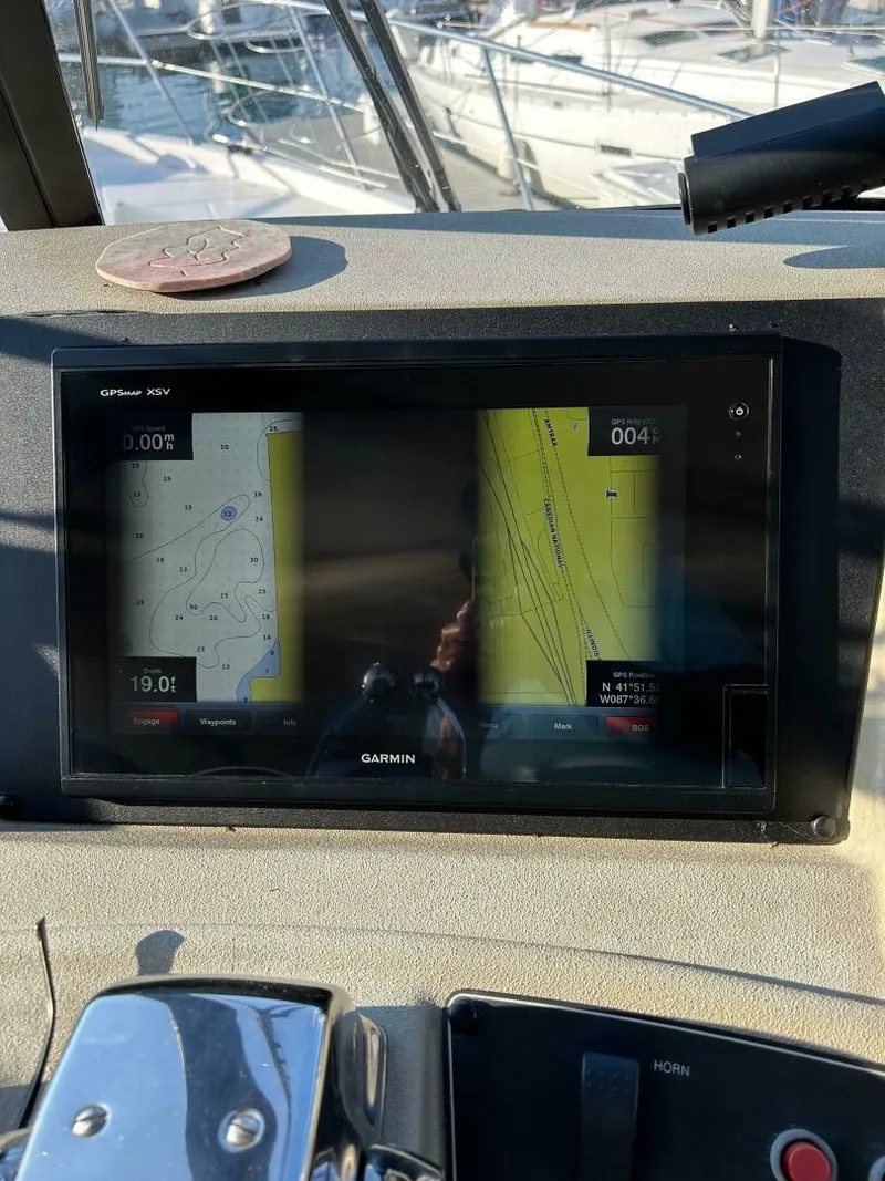 Slide: The Image of Garmin GPS display on 1996 Bayliner 4788 Pilot House Motoryacht dashboard. - 7