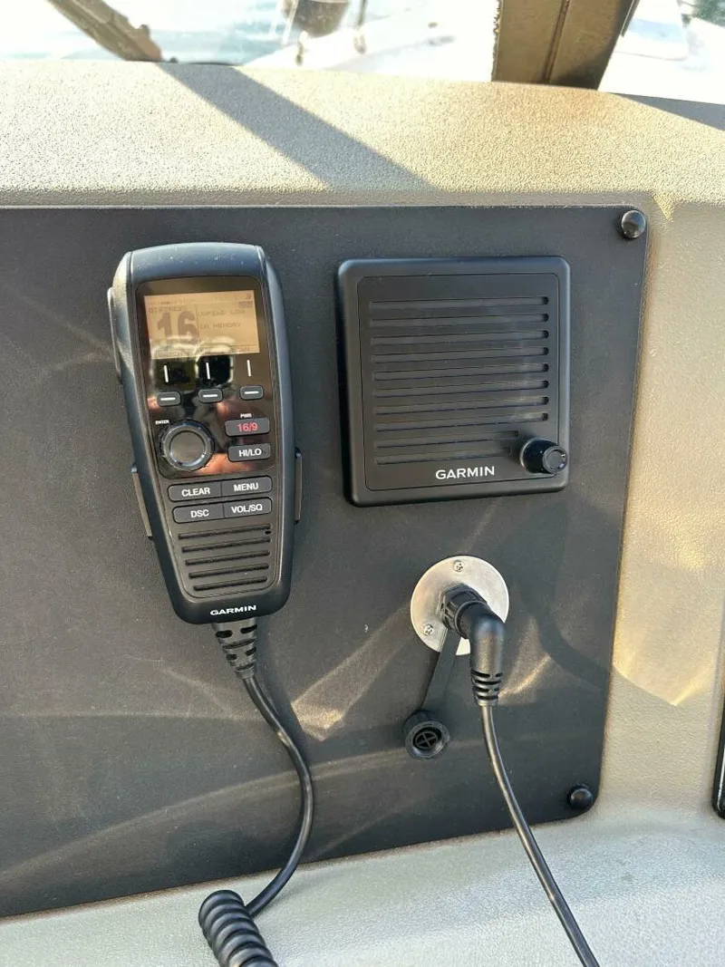 Slide: The Image of Garmin radio system on 1996 Bayliner 4788 Pilot House Motoryacht dashboard. - 8