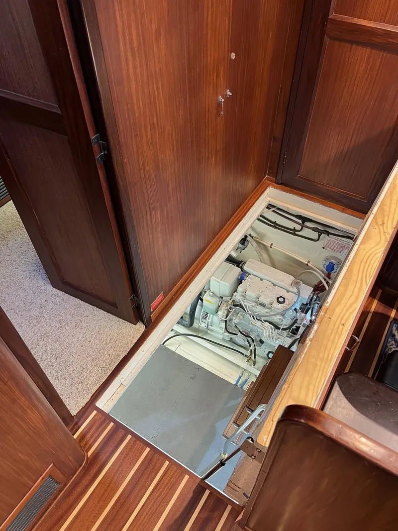 Slide: The Image of Engine compartment of 1987 Hatteras 68 Cockpit Motor Yacht, wooden interior. - 38
