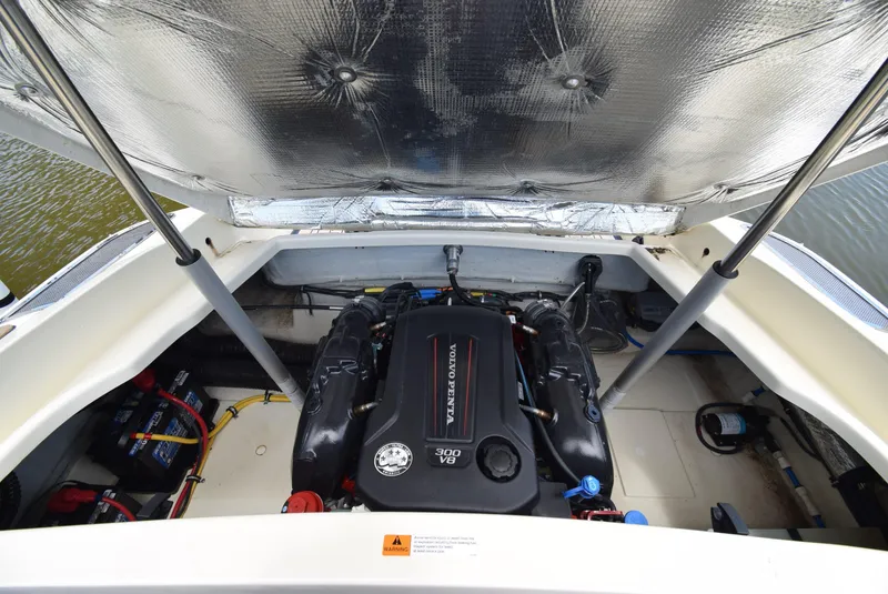 Slide: The Image of 2017 Chris-Craft Launch 25 engine compartment with Volvo Penta V8 engine. - 8