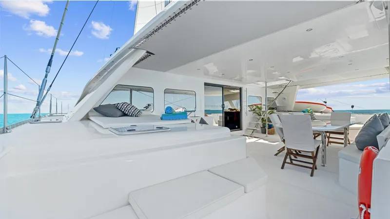 Slide: The Image of Luxurious 2023 Mystique Yachts Silhouette 800 with spacious deck and elegant seating area. - 13