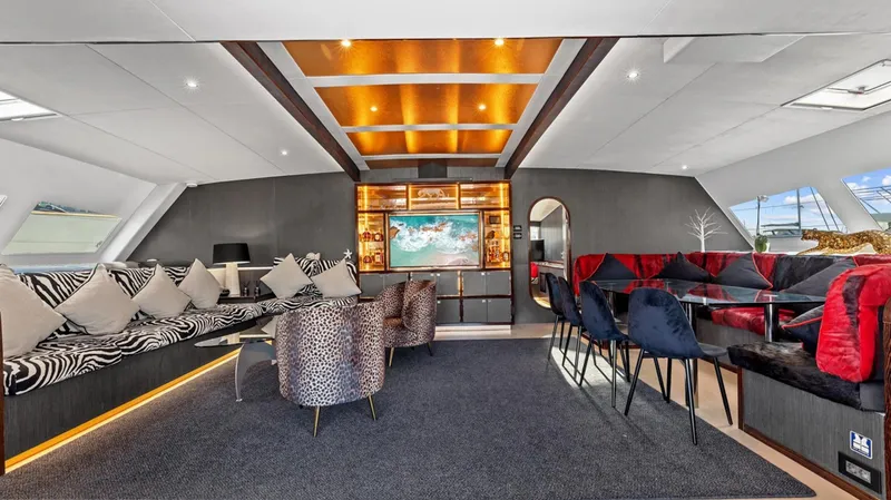 Slide: The Image of Luxurious 2023 Mystique Yachts Silhouette 800 interior with elegant seating and modern decor. - 17