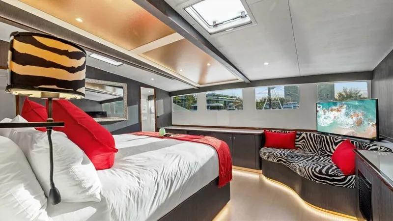 Slide: The Image of Luxurious 2023 Mystique Yachts Silhouette 800 bedroom with modern decor and vibrant accents. - 21