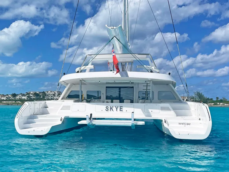 Slide: The Image of Luxurious 2023 Mystique Yachts Silhouette 800 catamaran on turquoise waters. - 6