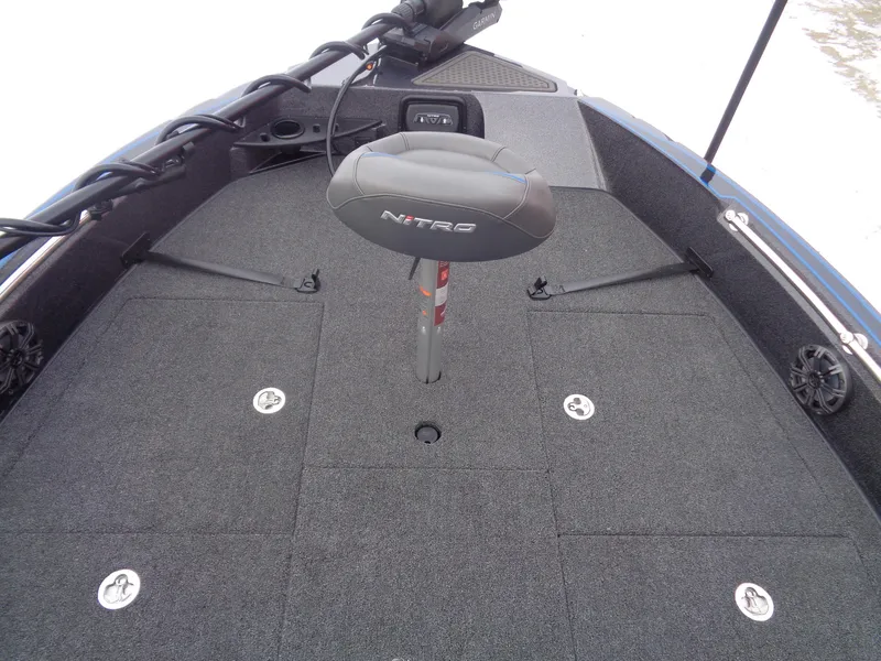 Slide: The Image of 2025 Nitro ZV20 Pro boat deck with seat and storage compartments. - 12
