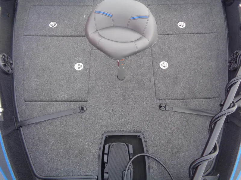 Slide: The Image of 2025 Nitro ZV20 Pro boat interior with gray carpet and swivel seat. - 13