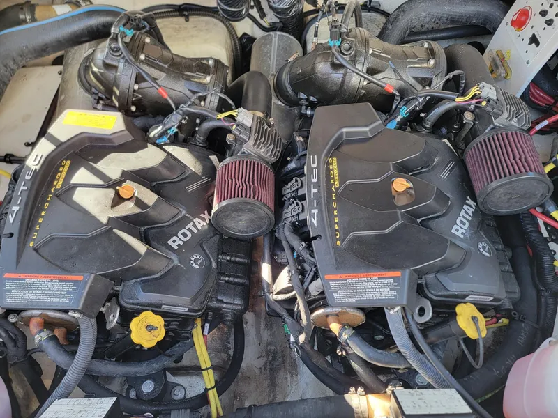 Slide: The Image of Twin Rotax engines in a 2016 Chaparral Vortex 223 VRX boat. - 11