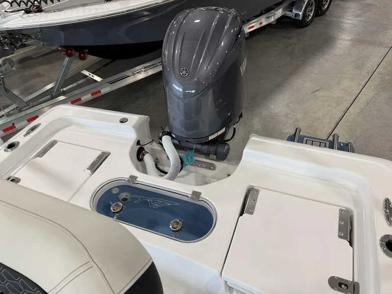 Slide: The Image of 2025 Tidewater 1910 BM boat with Yamaha outboard motor in showroom. - 18