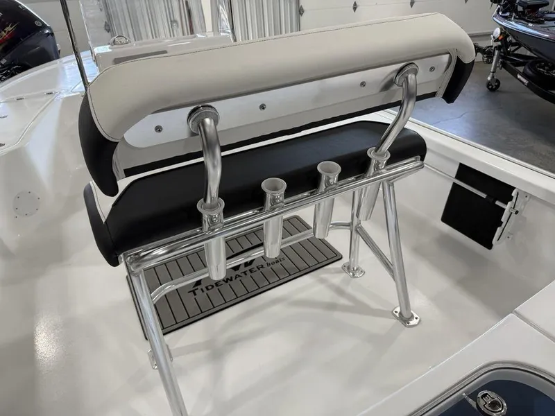 Slide: The Image of Tidewater 1910 BM 2025 boat interior with seating and rod holders. - 25