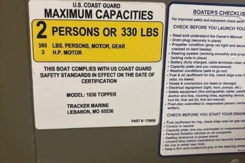 Slide: The Image of 2017 Tracker Topper 1036 Riveted Jon boat capacity label, U.S. Coast Guard compliance details. - 4
