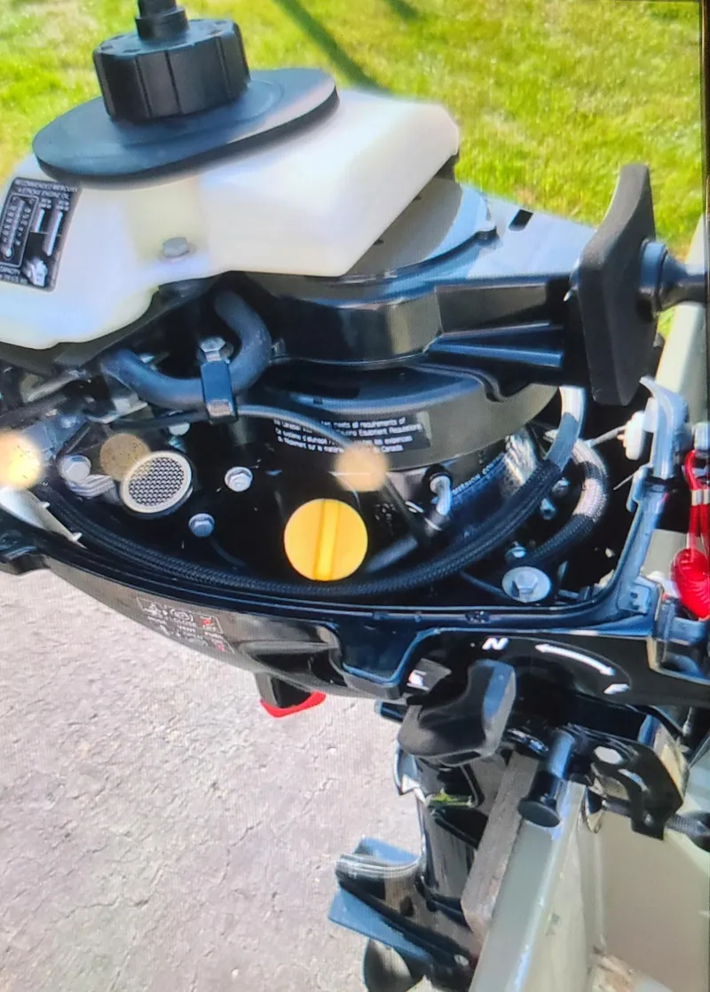 Slide: The Image of 2017 Tracker Topper 1036 Riveted Jon boat motor, close-up view. - 7