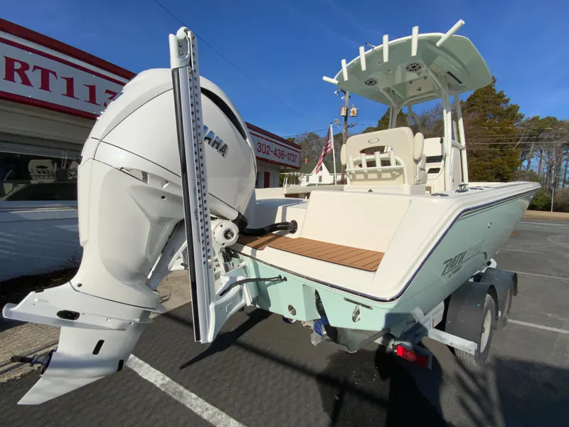 Slide: The Image of 2025 Pathfinder 2400 TRS boat with Yamaha outboard engine on trailer. - 10