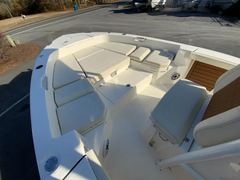 Slide: The Image of 2025 Pathfinder 2400 TRS boat interior with spacious seating and modern design. - 27