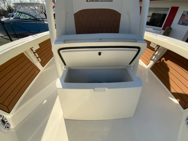Slide: The Image of 2025 Pathfinder 2400 TRS boat interior with open storage compartment. - 31