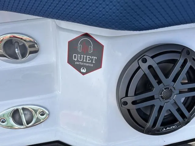 Slide: The Image of 2024 Scarab SBI285 boat with JL Audio speaker and "Quiet Performance" sticker. - 10