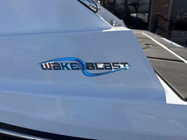 Slide: The Image of 2024 Scarab SBI285-2024 boat with "Wake Blast" logo on white hull. - 22