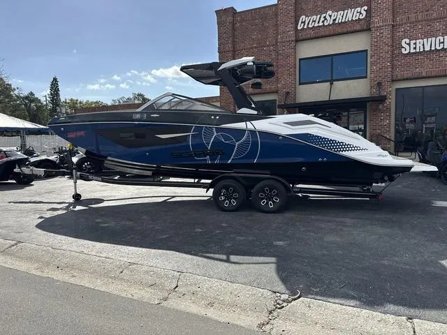 Slide: The Image of 2024 Scarab SBI285 boat parked outside CycleSprings service center. - 5