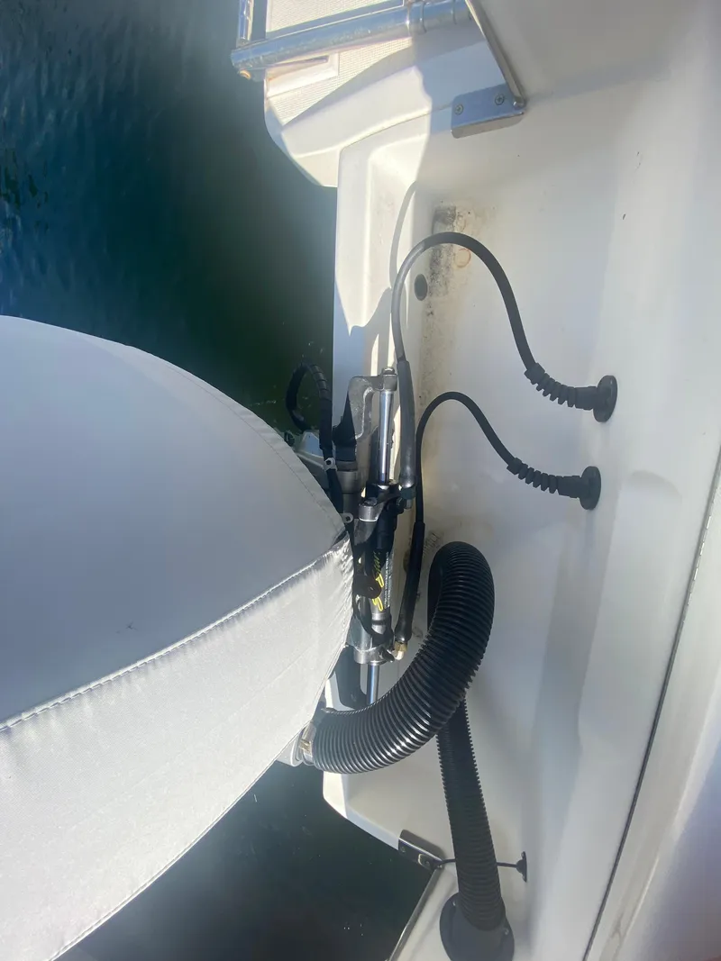 Slide: The Image of Close-up of 2005 Scout 210 Sportfish boat interior with cables and seat. - 4