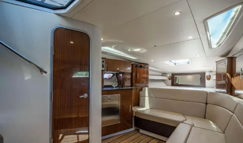 Slide: The Image of Luxurious interior of 2015 Regal 35 Sport Coupe yacht with modern amenities. - 11