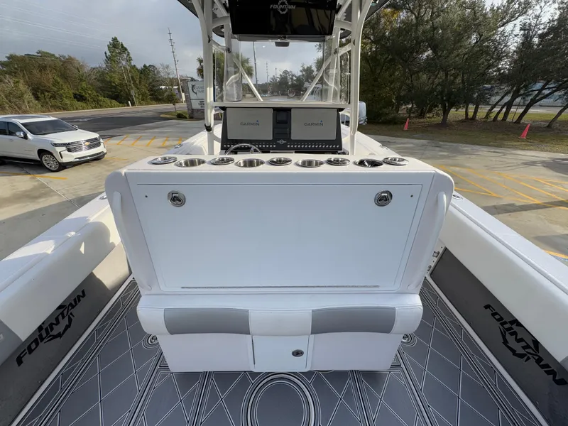 Slide: The Image of 2018 Fountain 34 CC boat interior with console and seating. - 33