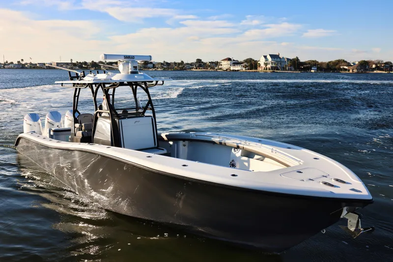 Slide: The Image of 2023 Yellowfin 36 Offshore boat cruising on a sunny day. - 3