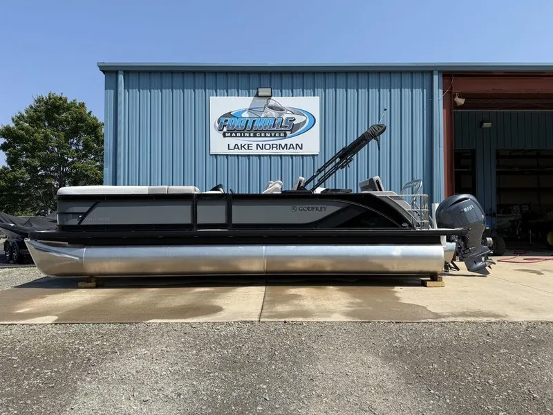The Image of 2025 Godfrey Sweetwater 2486 DT pontoon boat at Lake Norman marine center. - 1