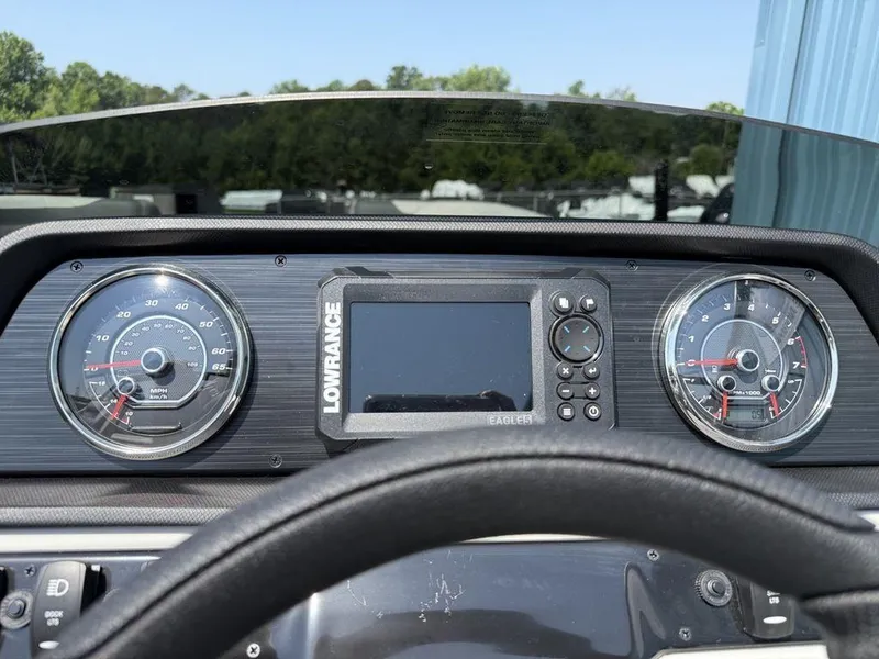 Slide: The Image of Dashboard of 2025 Godfrey Sweetwater 2486 DT boat with Lowrance display and gauges. - 14