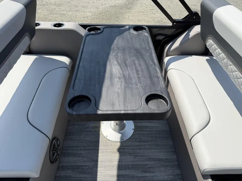 Slide: The Image of Interior of 2025 Godfrey Sweetwater 2486 DT boat with seating and table. - 22