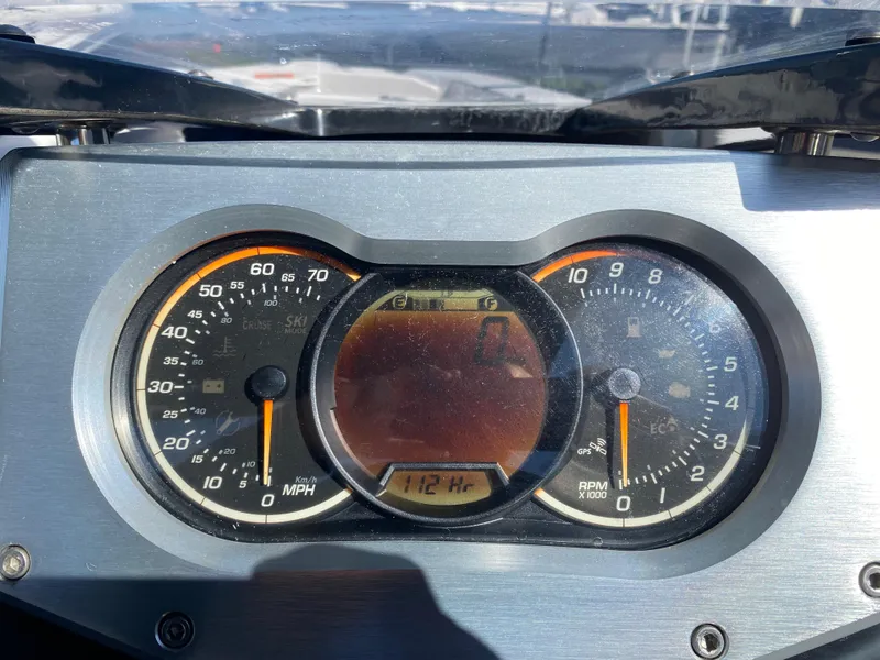Slide: The Image of Dashboard of 2018 Scarab 165 G showing speedometer and tachometer. - 11