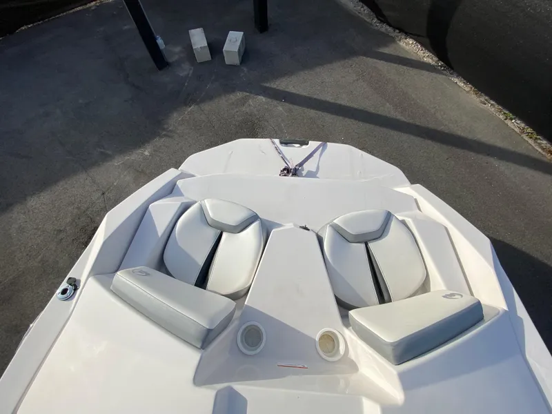 Slide: The Image of 2018 Scarab 165 G boat, white seating, aerial view. - 28
