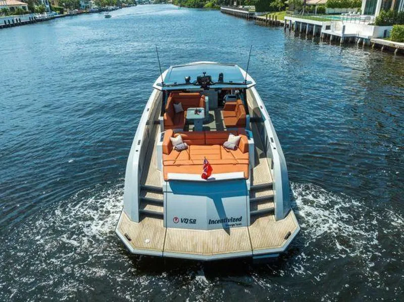Slide: The Image of Luxury Vanquish VQ58 yacht cruising on a scenic waterway, 2021 model. - 42