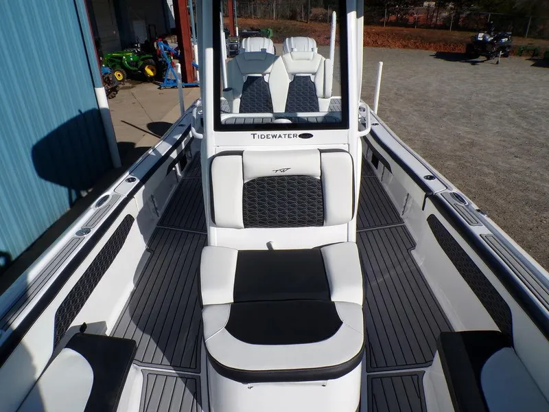 Slide: The Image of 2025 Tidewater 2700 CB boat interior with sleek seating and modern design. - 11