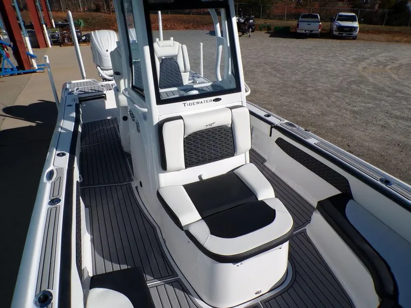 Slide: The Image of 2025 Tidewater 2700 CB boat interior with sleek seating and modern design. - 12