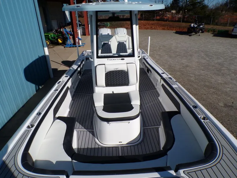 Slide: The Image of 2025 Tidewater 2700 CB boat with sleek design and spacious deck. - 13